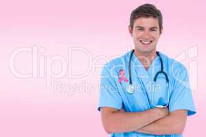 Composite image of young nurse in blue tunic with arms crossed