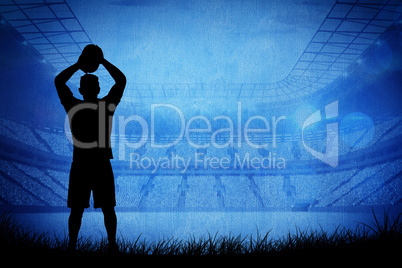 Composite image of silhouette of rugby player