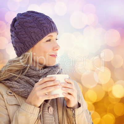 Composite image of pretty blonde with mug