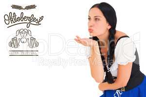 Composite image of pretty oktoberfest girl blowing a kiss