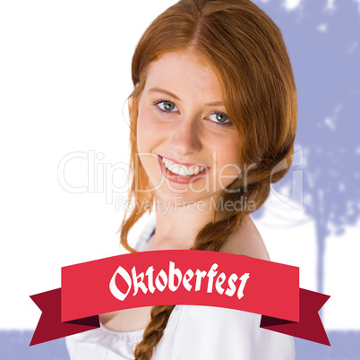 Composite image of oktoberfest girl smiling at camera
