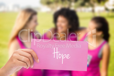 Hope against three laughing runners supporting breast cancer mar
