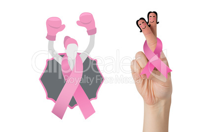 Composite image of crossed fingers with breast cancer ribbon