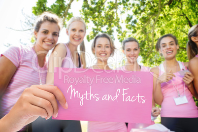 Myths and facts against smiling women organising event for breas