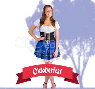 Composite image of oktoberfest girl smiling at camera