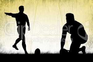 Composite image of silhouette of rugby player