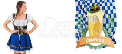 Composite image of pretty oktoberfest girl with hands on hips