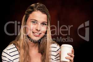 Composite image of portrait of smiling female student holding di