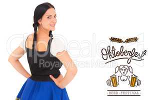 Composite image of pretty oktoberfest girl smiling at camera