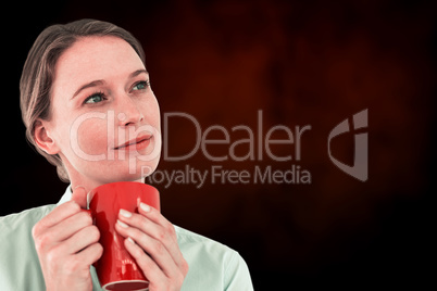 Composite image of businesswoman holding her mug and thinking