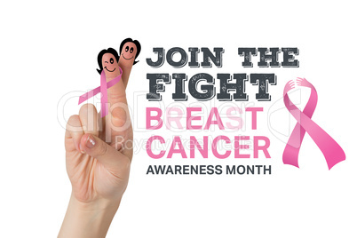 Composite image of crossed fingers with breast cancer ribbon