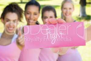 Fight against smiling women in pink for breast cancer awareness