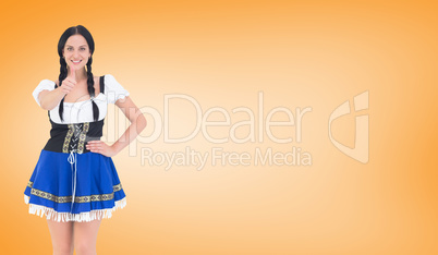 Composite image of pretty oktoberfest girl posing and smiling