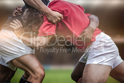 Composite image of rugby fans in arena