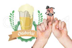 Composite image of oktoberfest character fingers