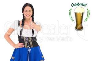 Composite image of pretty oktoberfest girl smiling at camera