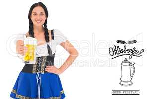 Composite image of pretty oktoberfest girl holding beer tankard