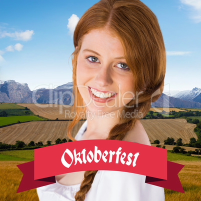 Composite image of oktoberfest girl smiling at camera