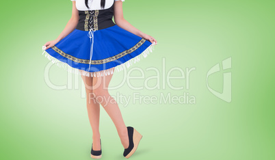 Composite image of oktoberfest girl spreading her skirt