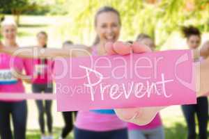 Prevent against smiling women running for breast cancer awarenes