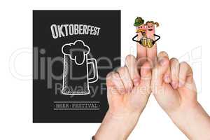 Composite image of oktoberfest character fingers