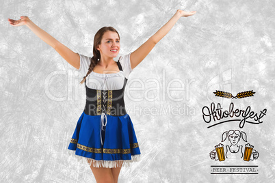 Composite image of pretty oktoberfest girl smiling with arms rai