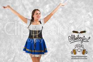 Composite image of pretty oktoberfest girl smiling with arms rai