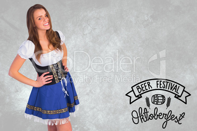 Composite image of oktoberfest girl smiling at camera