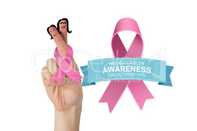 Composite image of crossed fingers with breast cancer ribbon