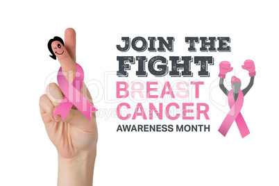 Composite image of crossed fingers with breast cancer ribbon