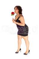 Lovely woman with red rose.