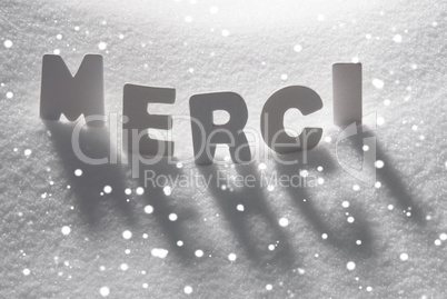 White Word Merci Means Thank You On Snow, Snowflakes