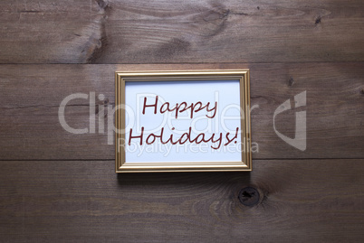 Golden Picture Frame With Copy Space And Text Happy Holidays