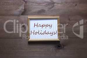 Golden Picture Frame With Copy Space And Text Happy Holidays
