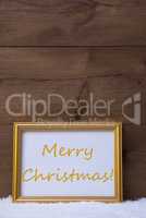 Golden Frame With Text Merry Christmas On Snow