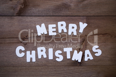 Wooden Background With White Letters Merry Christmas