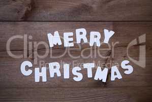Wooden Background With White Letters Merry Christmas