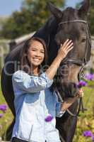 Beautiful Asian Eurasian Girl Leading Her Horse