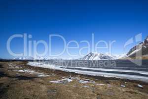 Snow-covered volcanic mountain landscape in Iceland