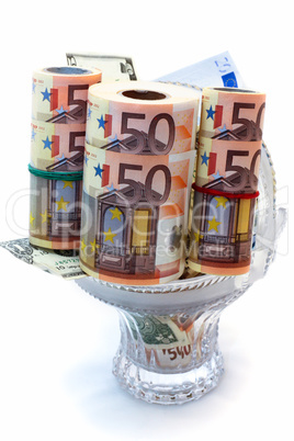 Monetary denominations laid in a vase