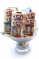 Monetary denominations laid in a vase