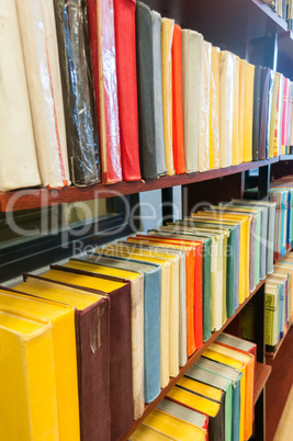 Books in wooden bookcases