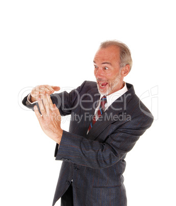 Happy businessman giving sign with hands.