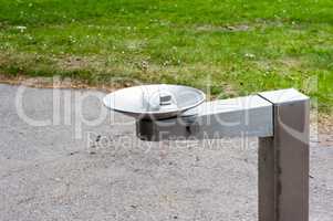 Metal drinking fountain in park