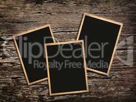 old vintage  photos on a wooden background