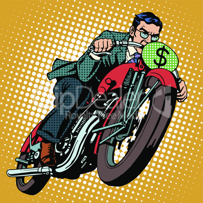 Businessman on a motorcycle. Financial success
