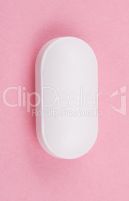 White Pill on Pink Background