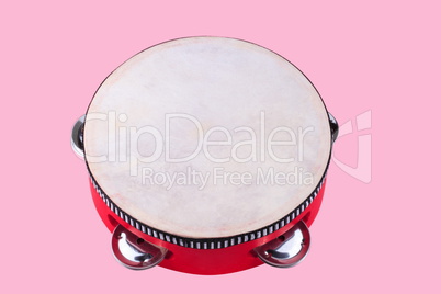 tambourine isolated on pink