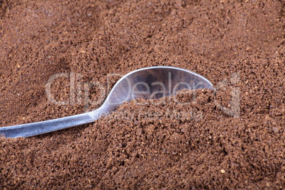 milled coffee  and teaspoon