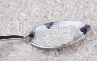 rice food background and teaspoon